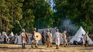 Cedynia Poland June 2019 Historical reenactment of Slavic or Vikings tribe lifestyle with warriors and villagers in a tent camp from 11th century